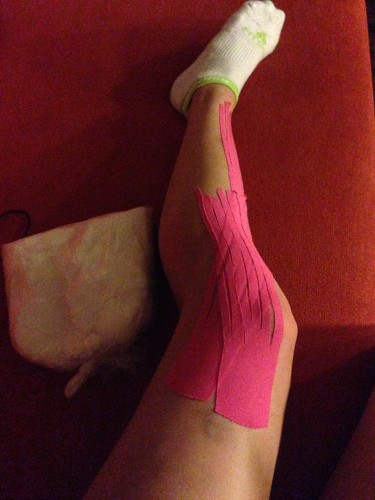 Ana's pretty pink tape job on my knee!