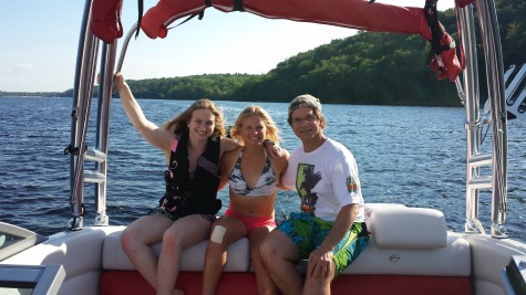 Mackenzie, me and my Dad out on the St. Croix river (Mom took the photo)