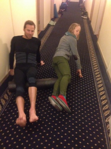 Andy and Liz sharing a foam roller, doing some classic US team hallway recovery after racing. 