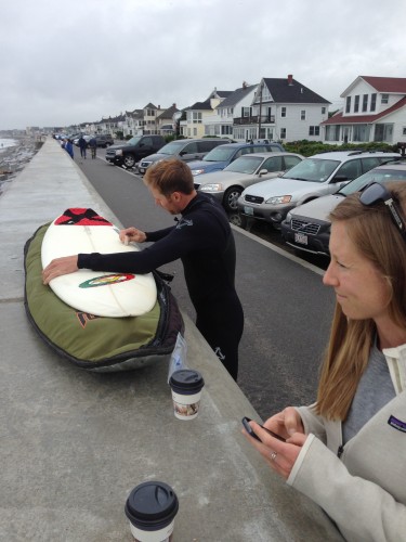 Andy and Erika getting the boards ready to go and scoping out the waves