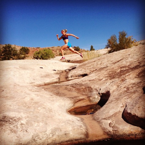 Hopping over the small pools of water we found on the slick rock (photo by Erika)
