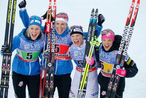 Third placed US team Jessica Diggins, Elizabeth Stephen, Sadie Bjornsen and Rosie Brennan pose on December 6, 2015 after the 4x5 km realy women cross-country event at the FIS ski World Cup in Lillehammer.   (Photo credit: POPPE/AFP/Getty Images)