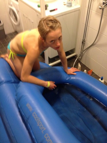 Liz sorting out the ice bath. Not super psyched about the cold, either. 