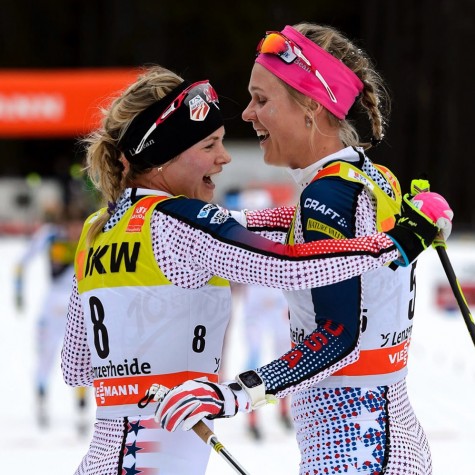 Finish line hugs with Sadie!  (Photo credit: FABRICE COFFRINI/AFP/Getty Images)