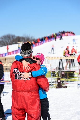 Getting a hug from Stillwater coach Bob! (photo from flying point road)