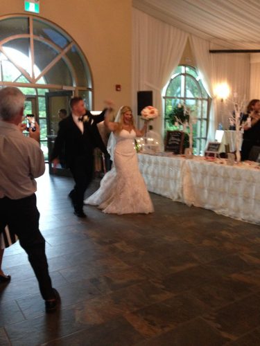 The bride and groom dancing in! 