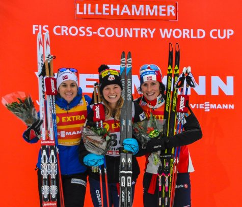 In great company! On the podium with Heidi and Marit. Where we got beautiful flowers and 10lbs of cheese! (photo by Getty Images/AFP)
