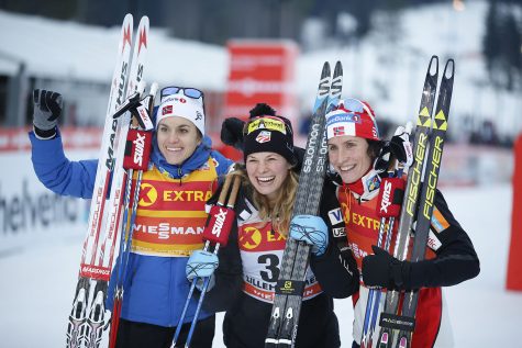 Winner Jessica Diggins of USA (C), second placed Heidi Weng of Norway (L) and third placed Marit Bjorgen of Norway (R), pose after the women's Cross Country 5 km event at the FIS World Cup in Lillehammer, Norway on December 03, 2016. (Photo credit  TERJE PEDERSEN/AFP/Getty Images)