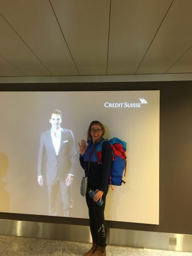 Sophie hamming it up with Federer's talking image in the Zurich airport. 