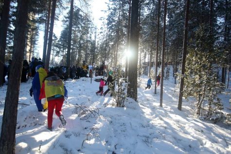 Spectators hiking through the woods to get to the course. There were so many people out cheering! (Rich Narum photo)