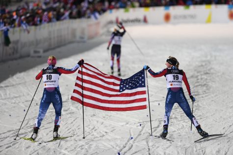 Skiing the flag down the home stretch! (photo by Getty Images)