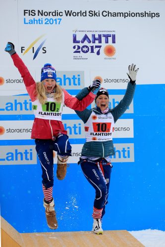 Jumping up on to the podium! (photo by Getty Images)