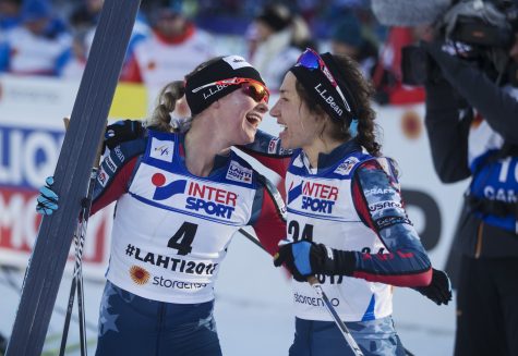 Teammate hugs in the finish with Chelsea Holmes! (Photo by Nils Petter Nilsson/Getty Images)